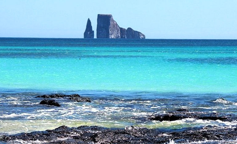 Two tourists in Bahia Sardina enjoying the trip on the 360  tour, San Cristobal - Galapagos Islands