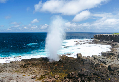 Two tourists in Bahia Rosa Blanca on the trip to the 360  tour, San Cristobal - Galapagos Islands