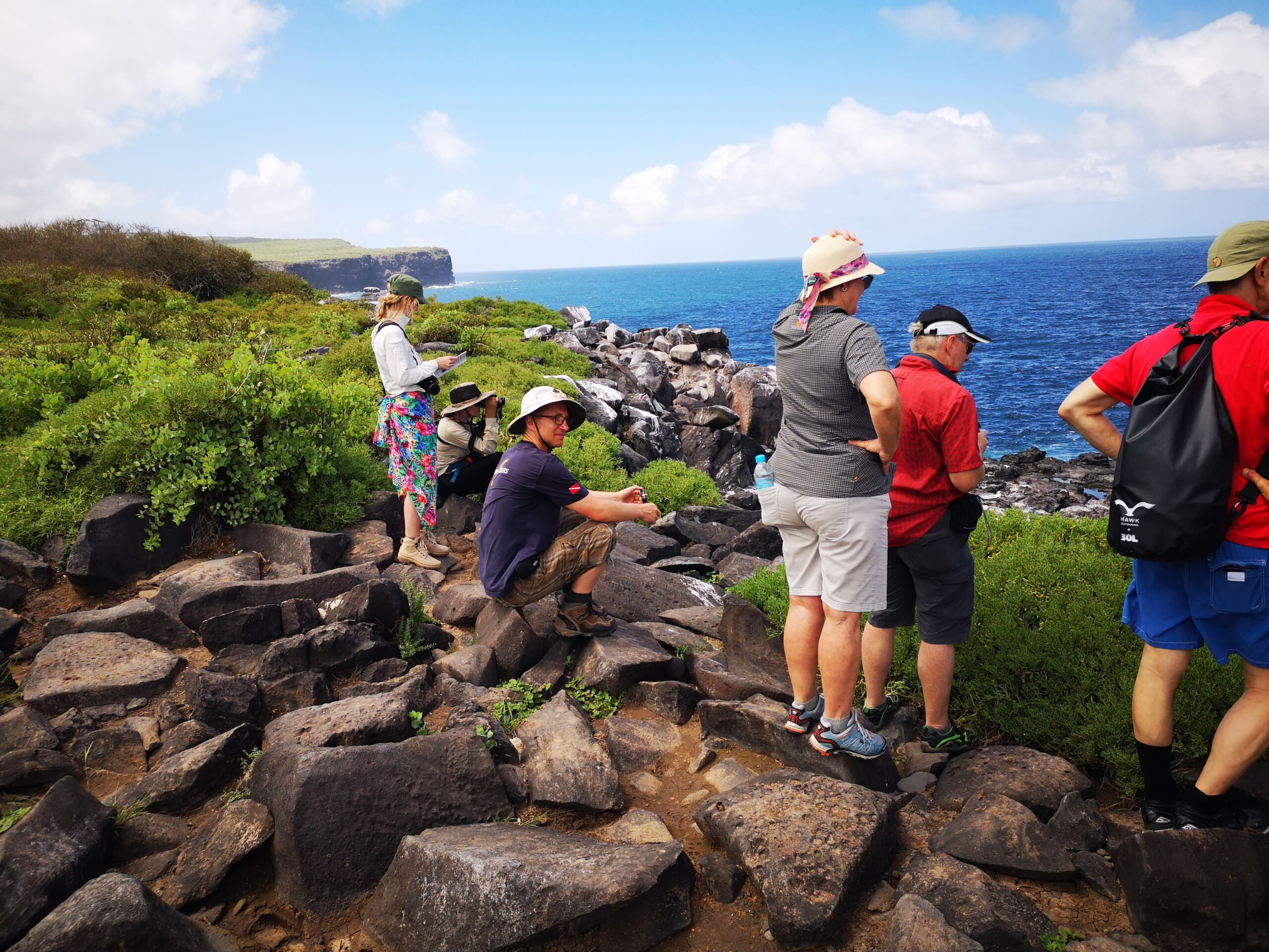 Two tourists in Bahia Rosa Blanca on the trip to the 360  tour, San Cristobal - Galapagos Islands